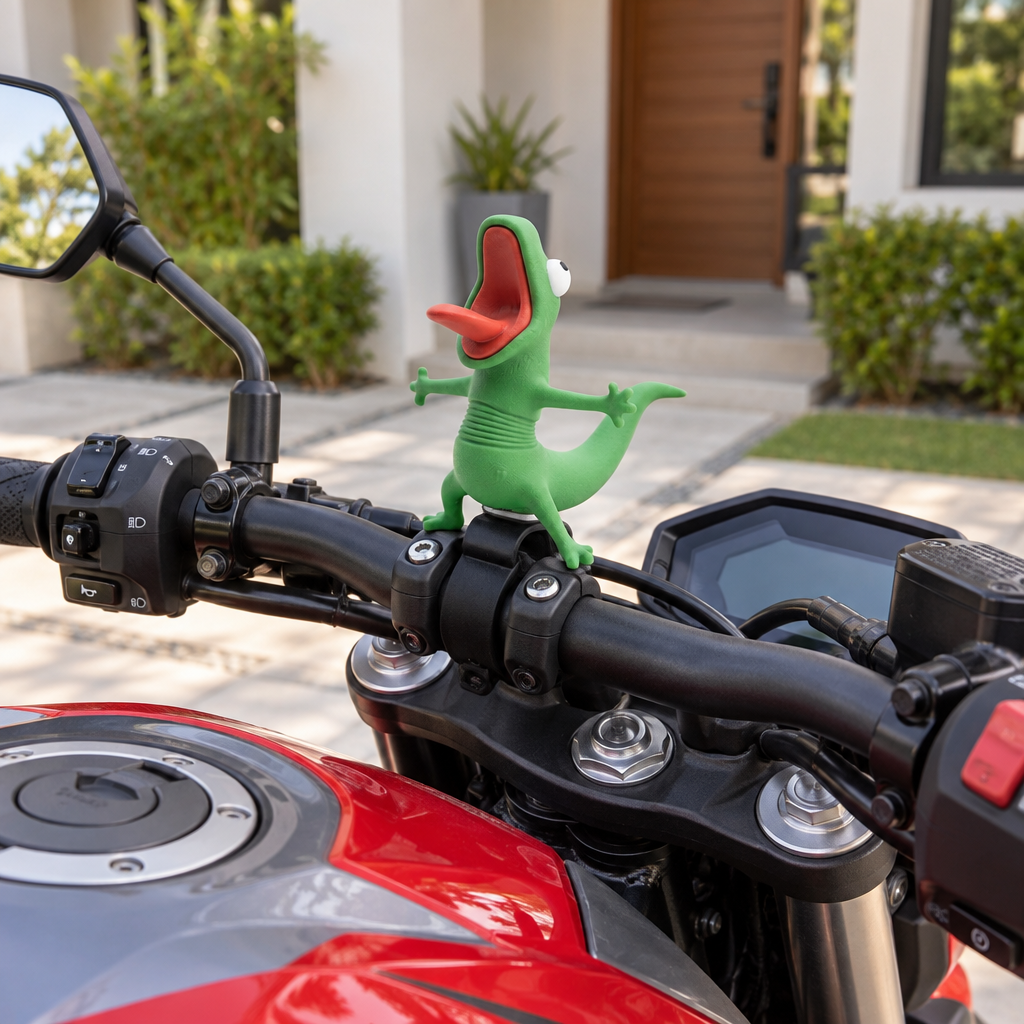 MotoPal Lizard mounted on the handlebars of a red motorcycle